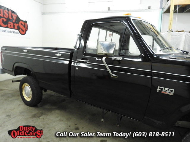 1986 Black Ford F-150 --