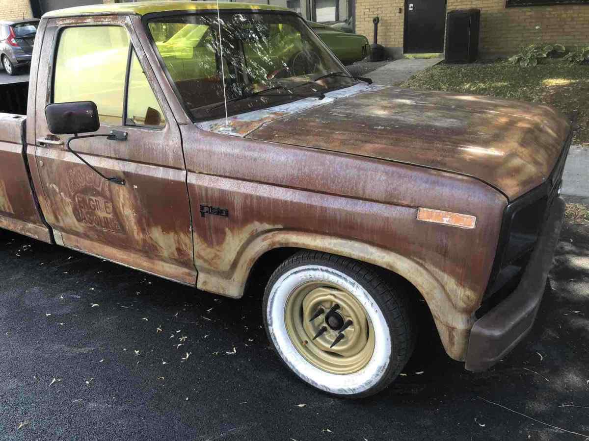 1986 Orange Ford F-150 Pickup