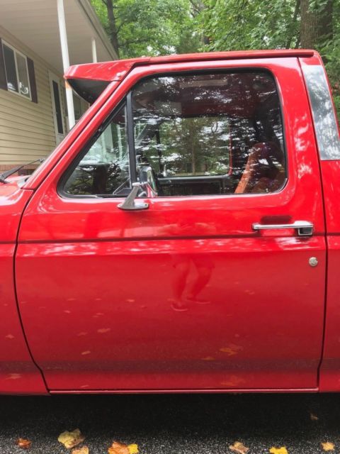 1986 Red Ford F-150 Standard Cab Pickup