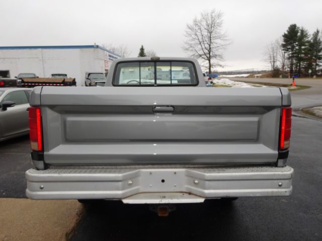 1986 Gray/Black Ford F-250 pickup-standard cab,longbox