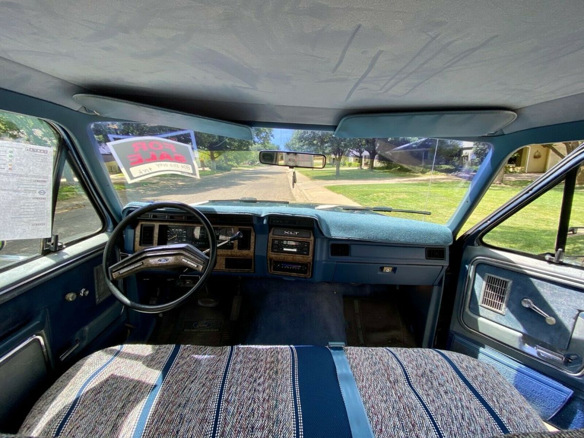 1986 Blue Ford F-250 Standard Cab Pickup