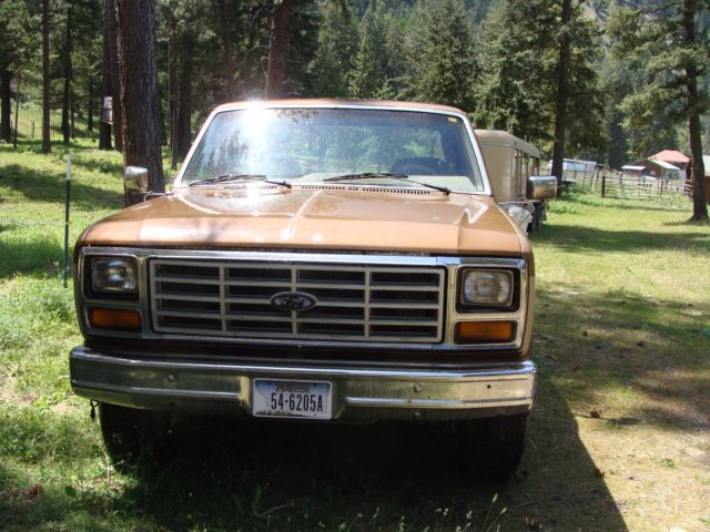 1986 tan and brown Ford F-350 Extended Crew Cab Pickup