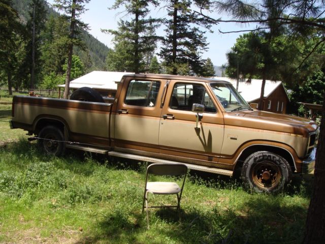 1986 tan and brown Ford F-350 Extended Crew Cab Pickup