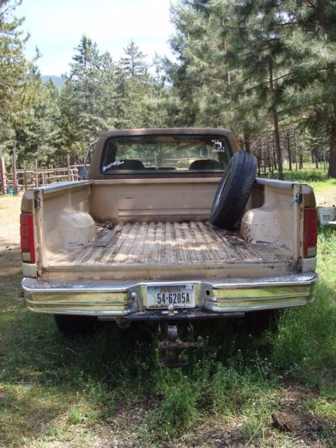 1986 tan and brown Ford F-350 Extended Crew Cab Pickup