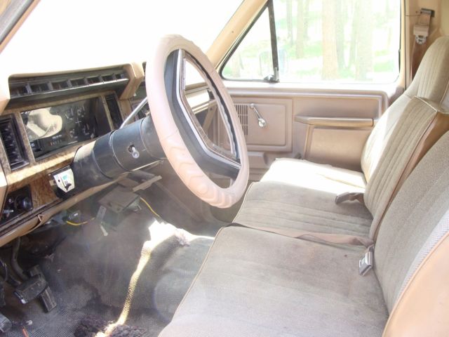 1986 tan and brown Ford F-350 Extended Crew Cab Pickup