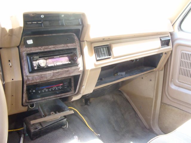 1986 tan and brown Ford F-350 Extended Crew Cab Pickup