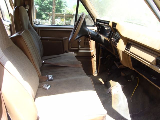 1986 tan and brown Ford F-350 Extended Crew Cab Pickup