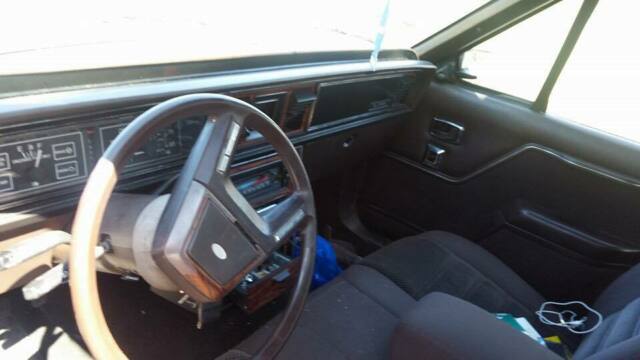 1986 Burgundy Ford LTD Sedan