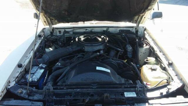 1986 Burgundy Ford LTD Sedan