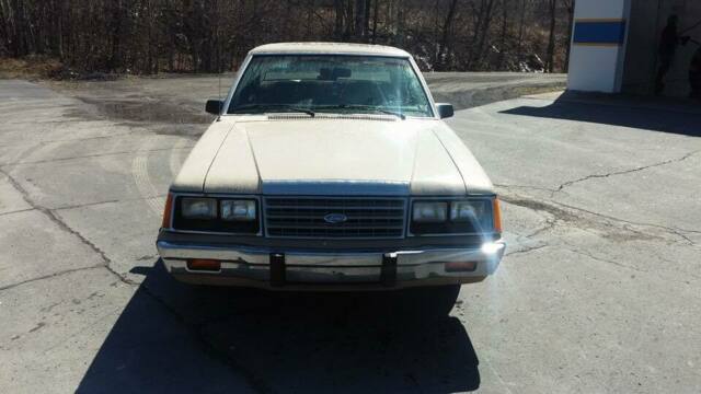 1986 Burgundy Ford LTD Sedan