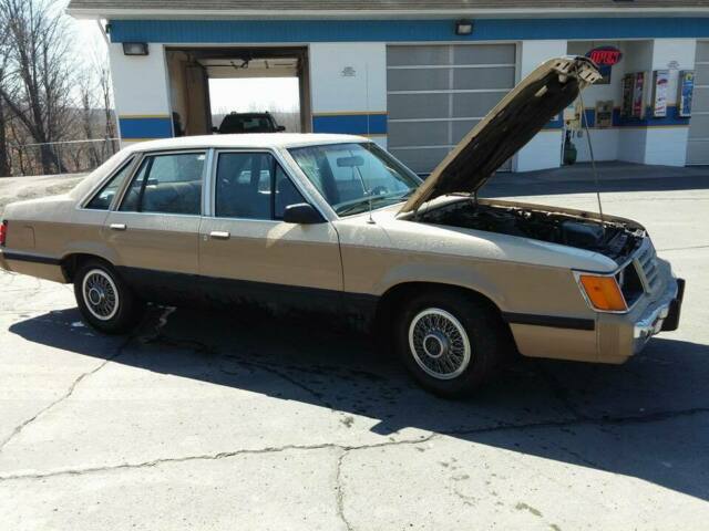 1986 Burgundy Ford LTD Sedan