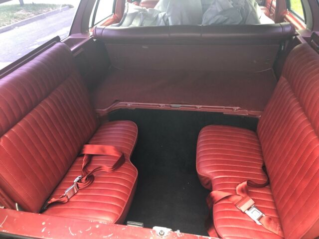 1986 Burgundy Ford Crown Victoria