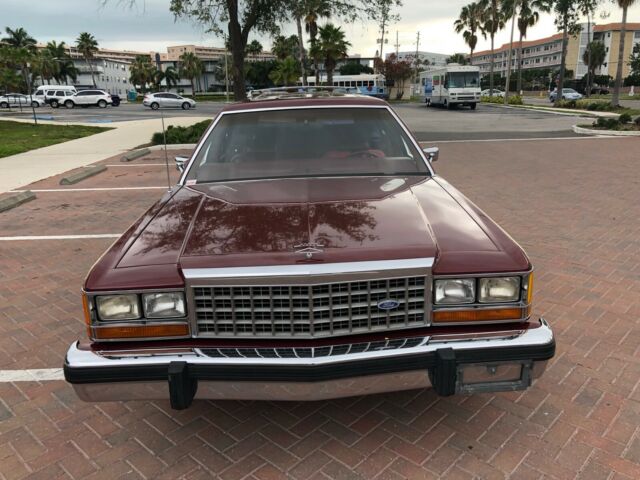 1986 Burgundy Ford Crown Victoria