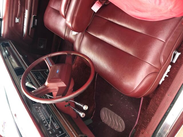 1986 Burgundy Ford Crown Victoria