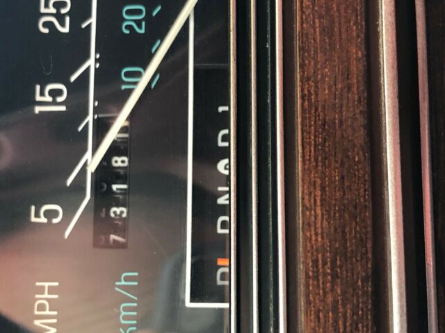 1986 Burgundy Ford Crown Victoria