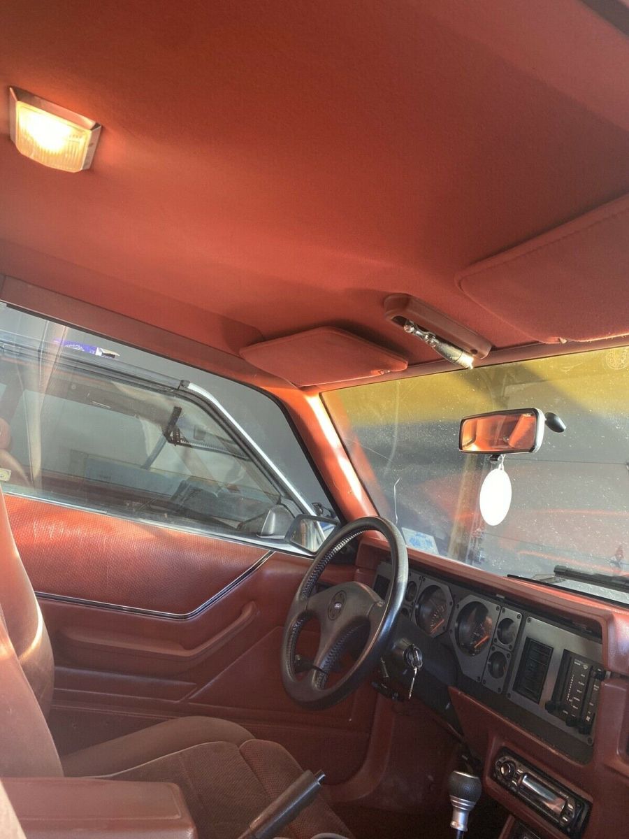 1986 Red Ford Mustang Sedan