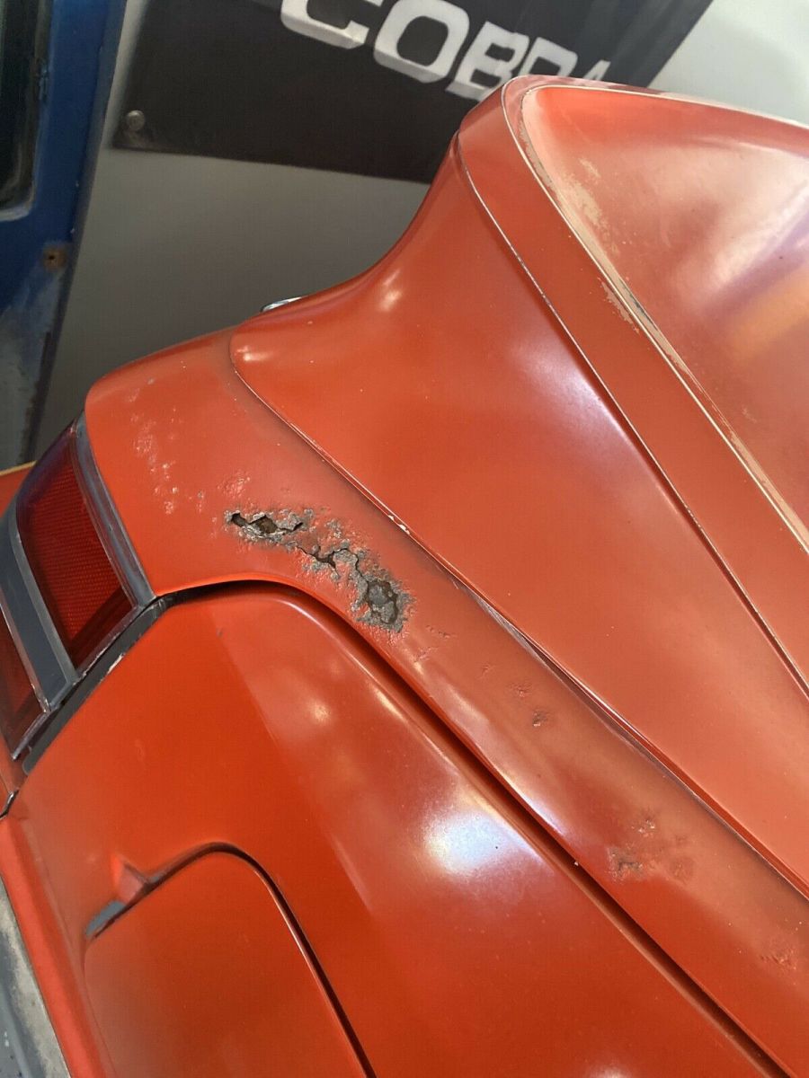 1986 Red Ford Mustang Sedan