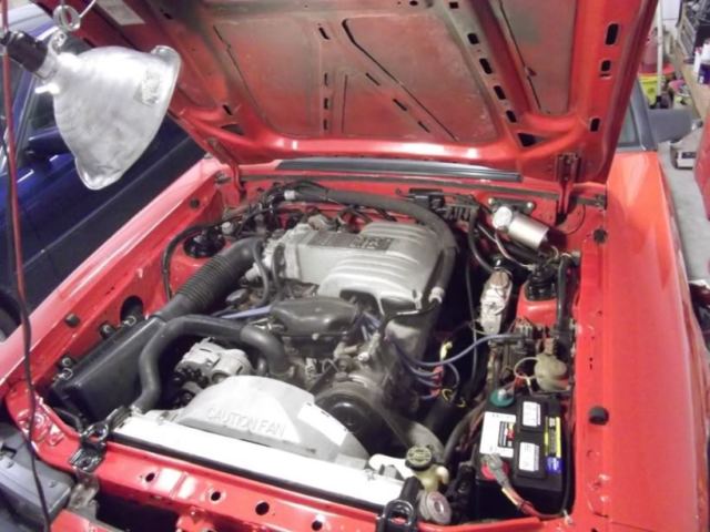 1986 Red Ford Mustang Convertible