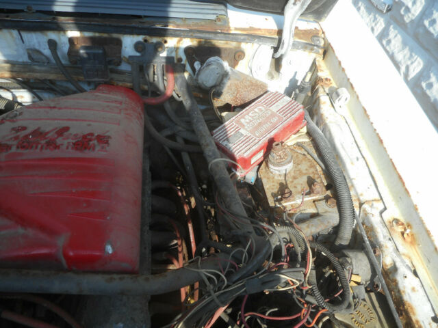 1986 white Ford Mustang Convertible