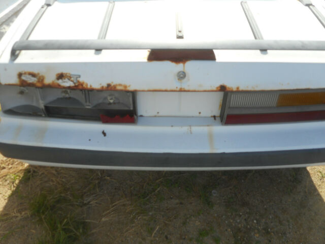 1986 white Ford Mustang Convertible