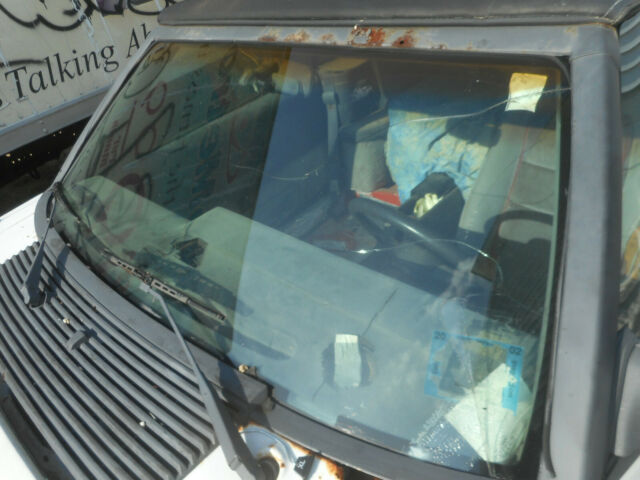 1986 white Ford Mustang Convertible