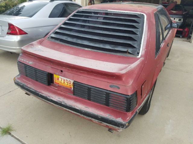 1986 Red Ford Mustang Hatchback