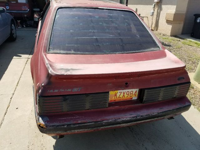 1986 Red Ford Mustang Hatchback