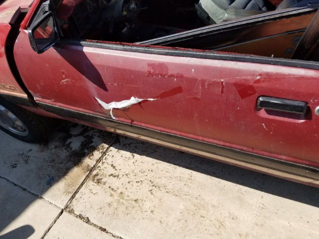 1986 Red Ford Mustang Hatchback