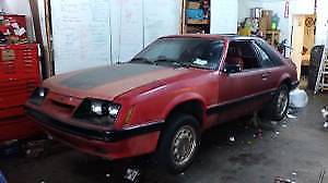 1986 Red Ford Mustang Hatchback