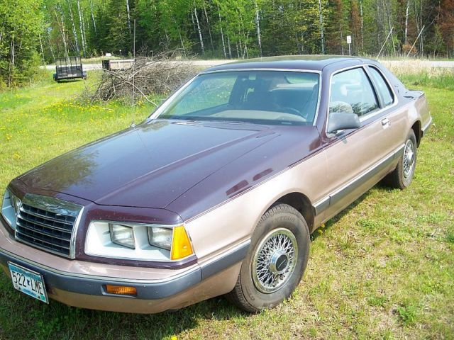 19860000 two tone brown Ford Thunderbird two door coupe