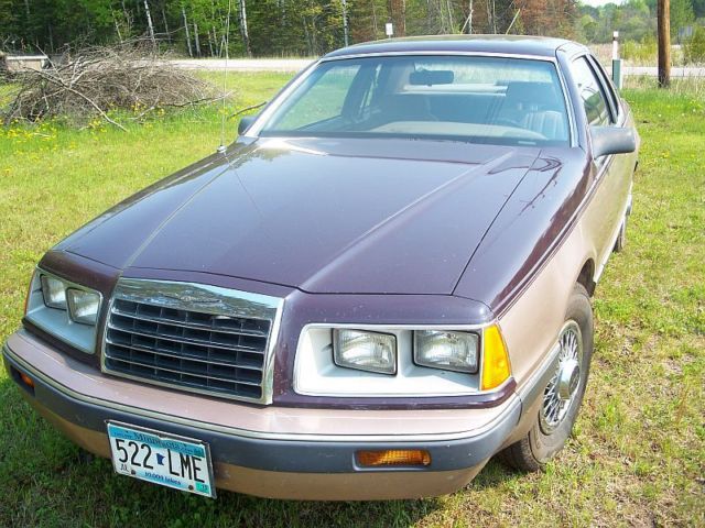 19860000 two tone brown Ford Thunderbird two door coupe
