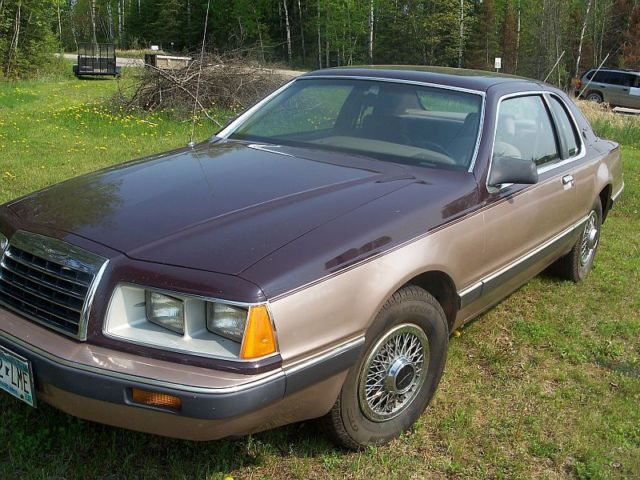 19860000 two tone brown Ford Thunderbird two door coupe