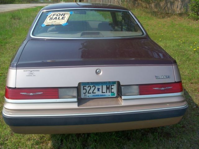 19860000 two tone brown Ford Thunderbird two door coupe