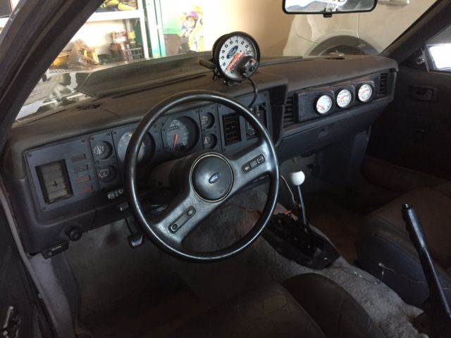 1986 Black Ford Mustang Hatchback