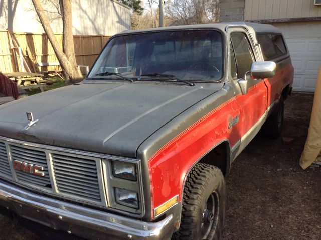 1986 red and grey GMC Sierra 1500 Standard Cab Pickup