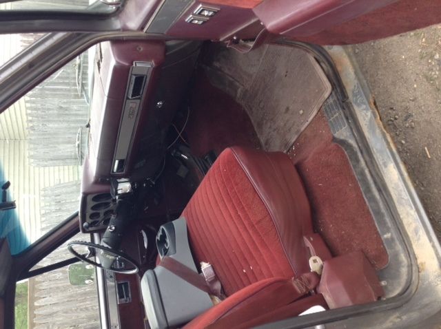 1986 red and grey GMC Sierra 1500 Standard Cab Pickup