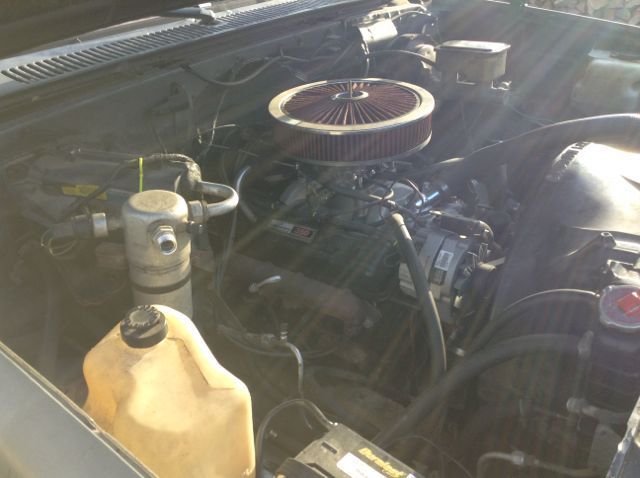 1986 red and grey GMC Sierra 1500 Standard Cab Pickup