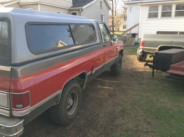 1986 red and grey GMC Sierra 1500 Standard Cab Pickup