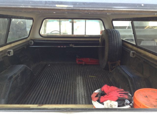 1986 red and grey GMC Sierra 1500 Standard Cab Pickup