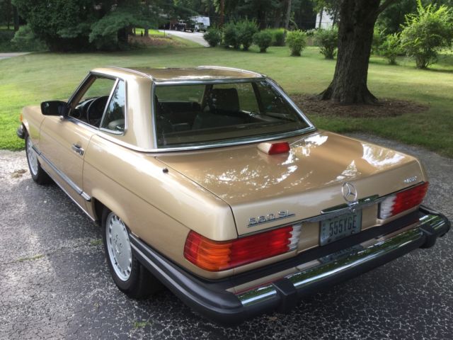 1986 Champagne Mercedes-Benz 500-Series convertible, 2 tops