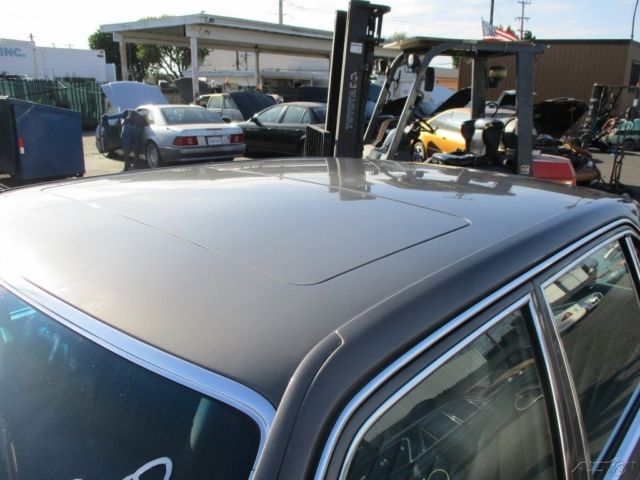 1986 Gray Mercedes-Benz 400-Series Sedan