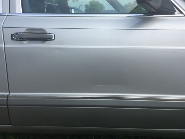 1986 Silver Mercedes-Benz 400-Series Sedan