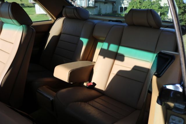 1986 Gold Mercedes-Benz 500-Series Coupe