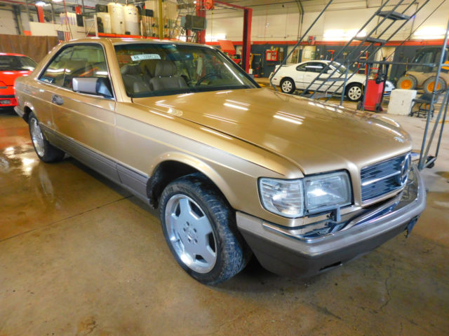 1986 Gold Mercedes-Benz 560 SEC Coupe