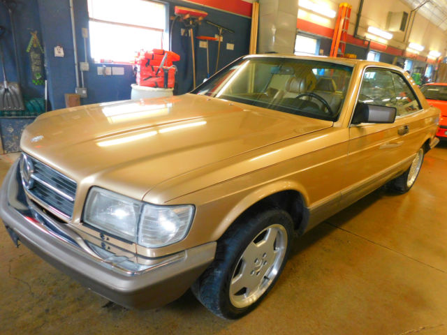 1986 Gold Mercedes-Benz 560 SEC Coupe