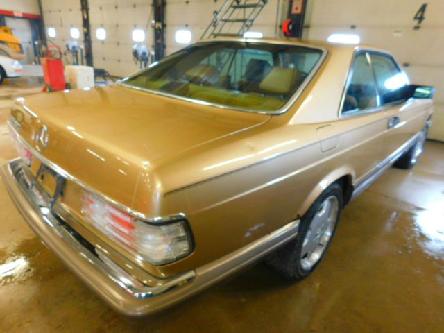 1986 Gold Mercedes-Benz 560 SEC Coupe