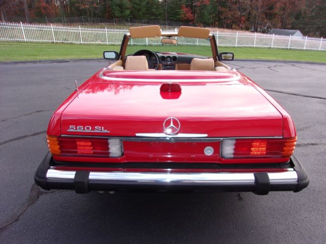 1986 torch red Mercedes-Benz SL-Class convertible