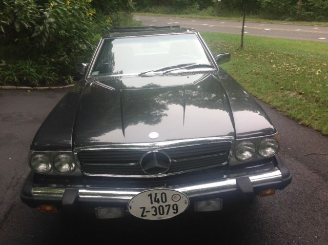 1986 torch red Mercedes-Benz SL-Class convertible
