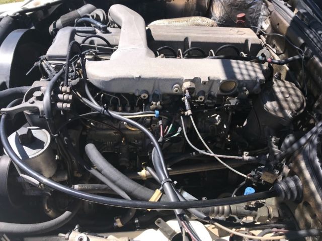 1986 Tan Mercedes-Benz 300-Series Sedan