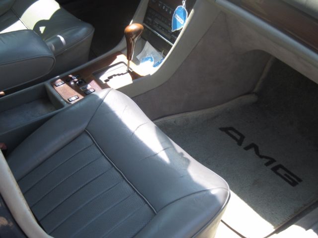 1986 Blue Mercedes-Benz 400-Series Sedan